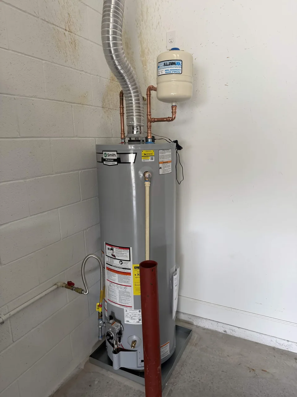 Tank water heater and its connected supply lines